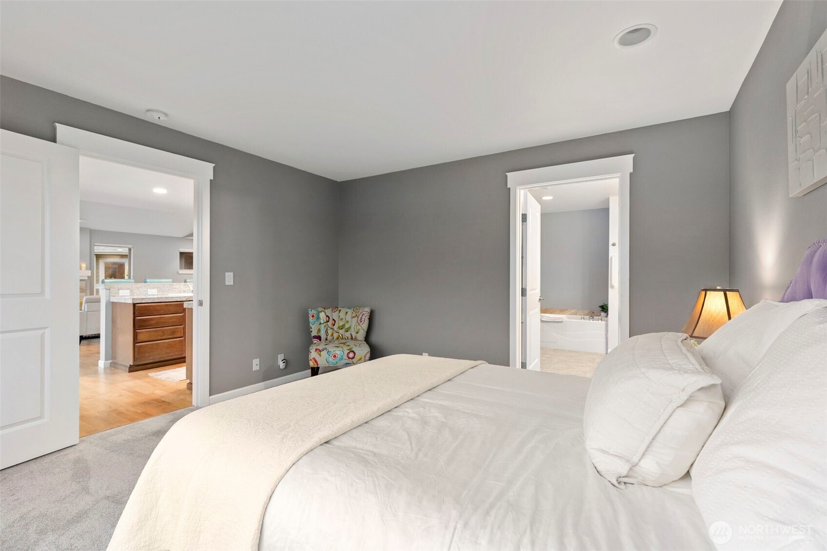 219 Apple Street Bremerton, WA 98310 - Photo 12 of 39 a bedroom with a bed and wooden floor