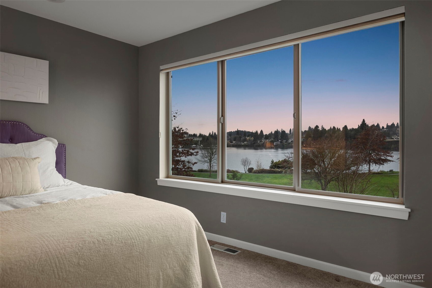 219 Apple Street Bremerton, WA 98310 - Photo 16 of 39 a bedroom with a large window and a bed