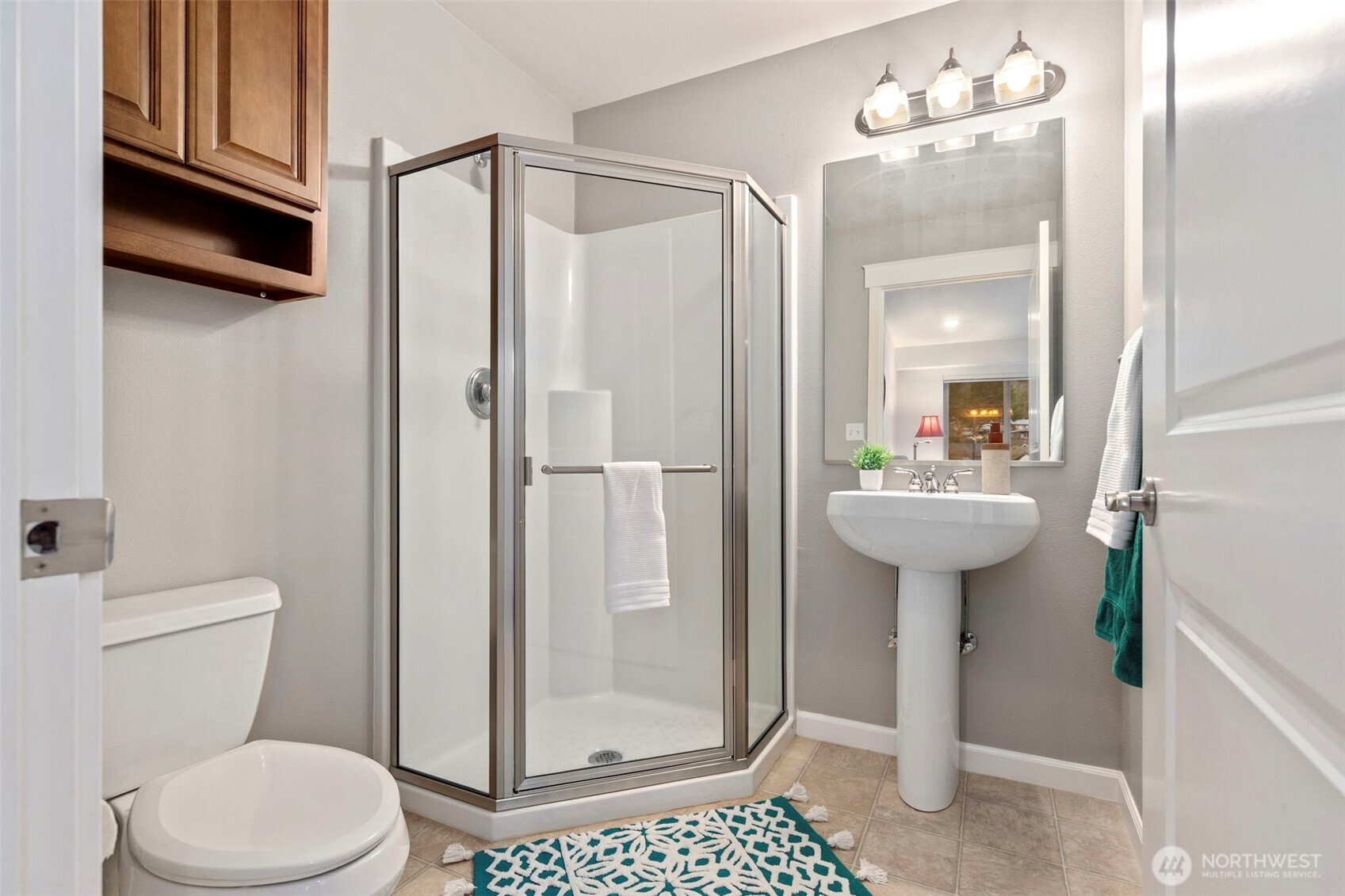 219 Apple Street Bremerton, WA 98310 - Photo 25 of 39 a bathroom with a sink toilet and shower