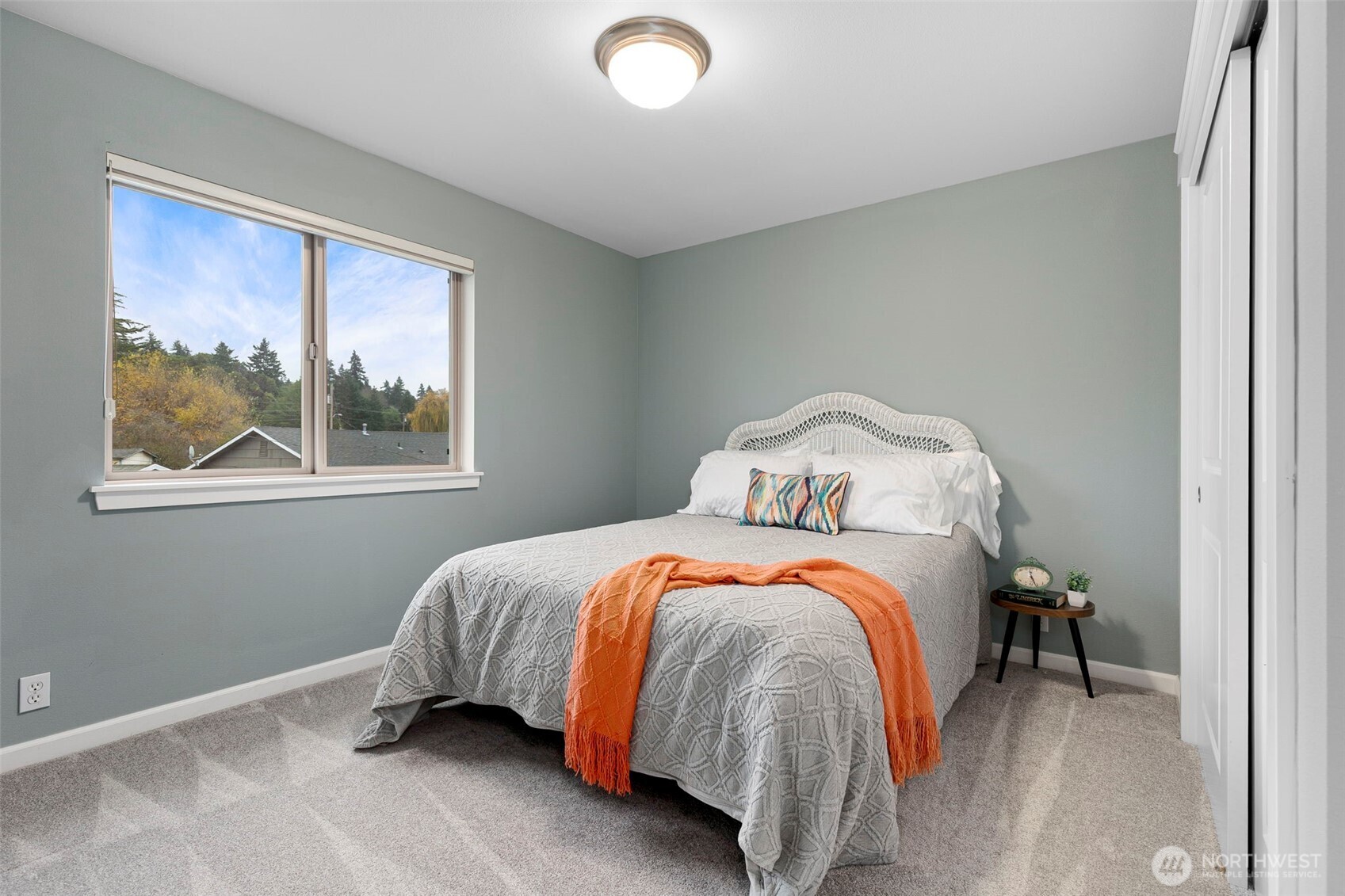 219 Apple Street Bremerton, WA 98310 - Photo 26 of 39 a bed sitting in a bedroom next to a window