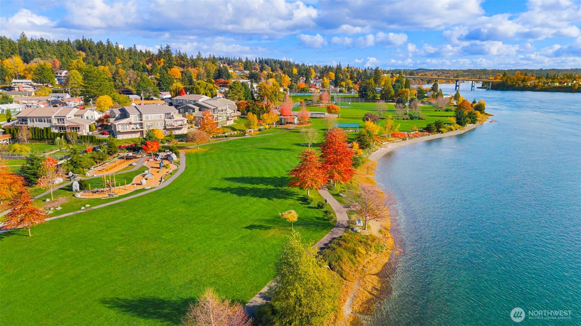 219 Apple Street Bremerton, WA 98310 - Photo 32 of 39 a view of a lake with a building in the background