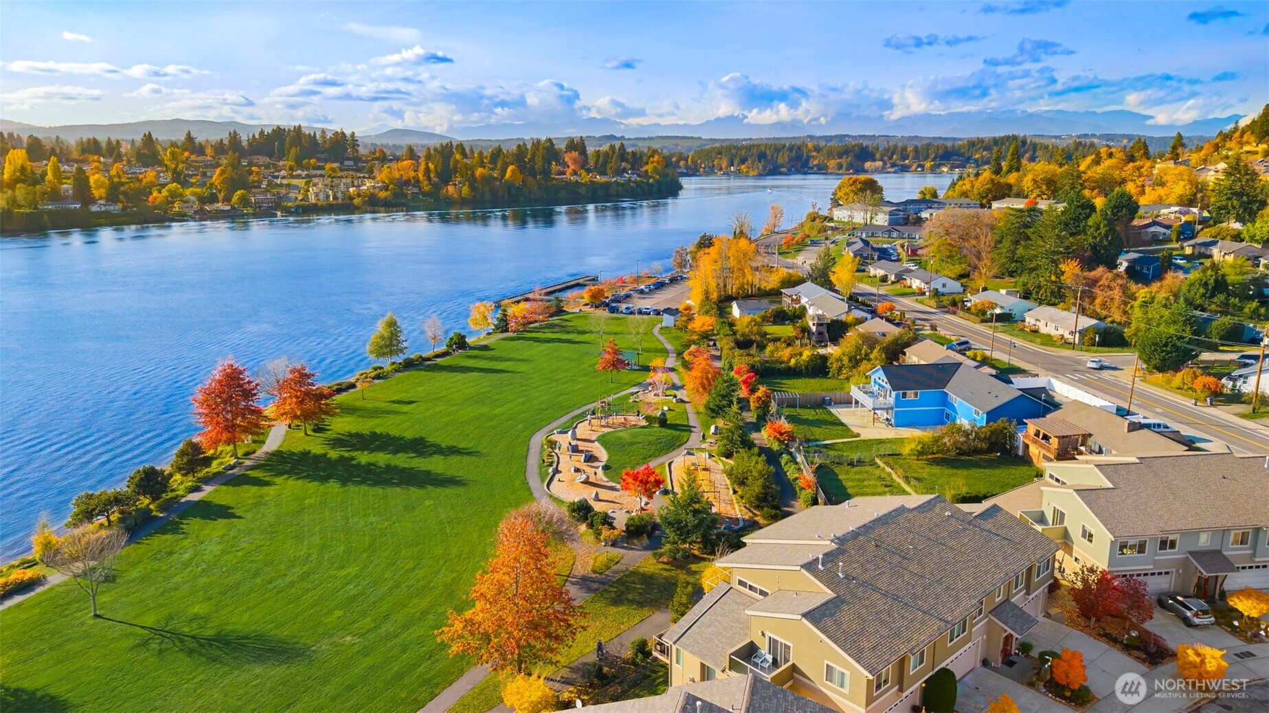 219 Apple Street Bremerton, WA 98310 - Photo 35 of 39 an aerial view of a houses with a lake view