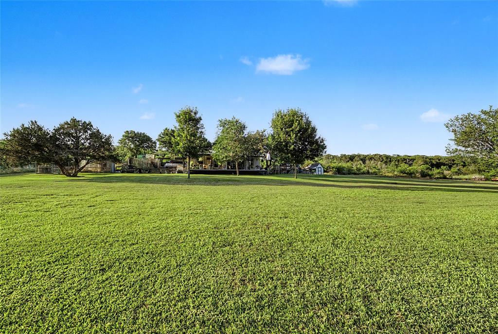 750 Belding Hollow Road Graford, TX 76449 - Photo 10 of 36 View of yard from water - NO AI