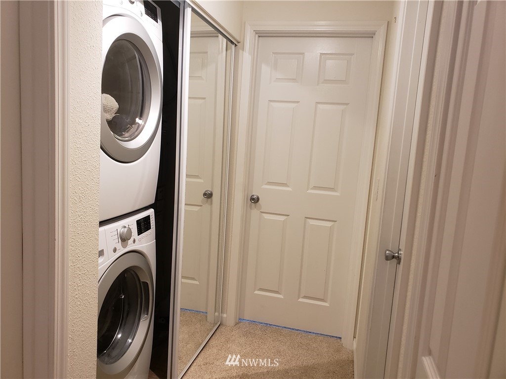 7510 208th Street Southwest, Unit B202 Edmonds, WA 98026 - Photo 11 of 13 a utility room with dryer and washer
