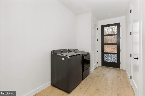 a view of a hallway with an empty room
