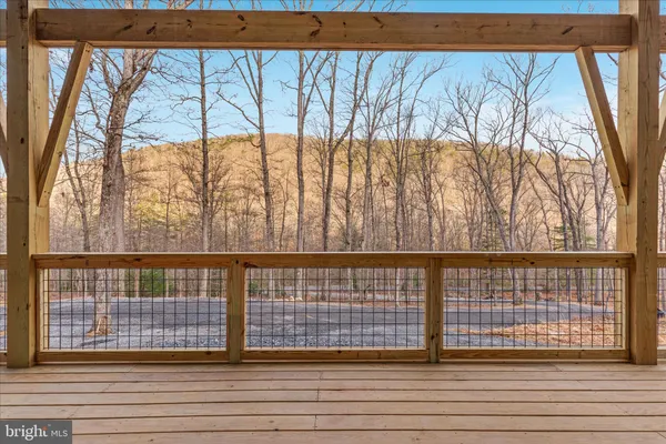 a view of wooden floor with a roof