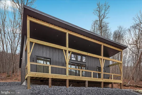 a house with trees in front of it