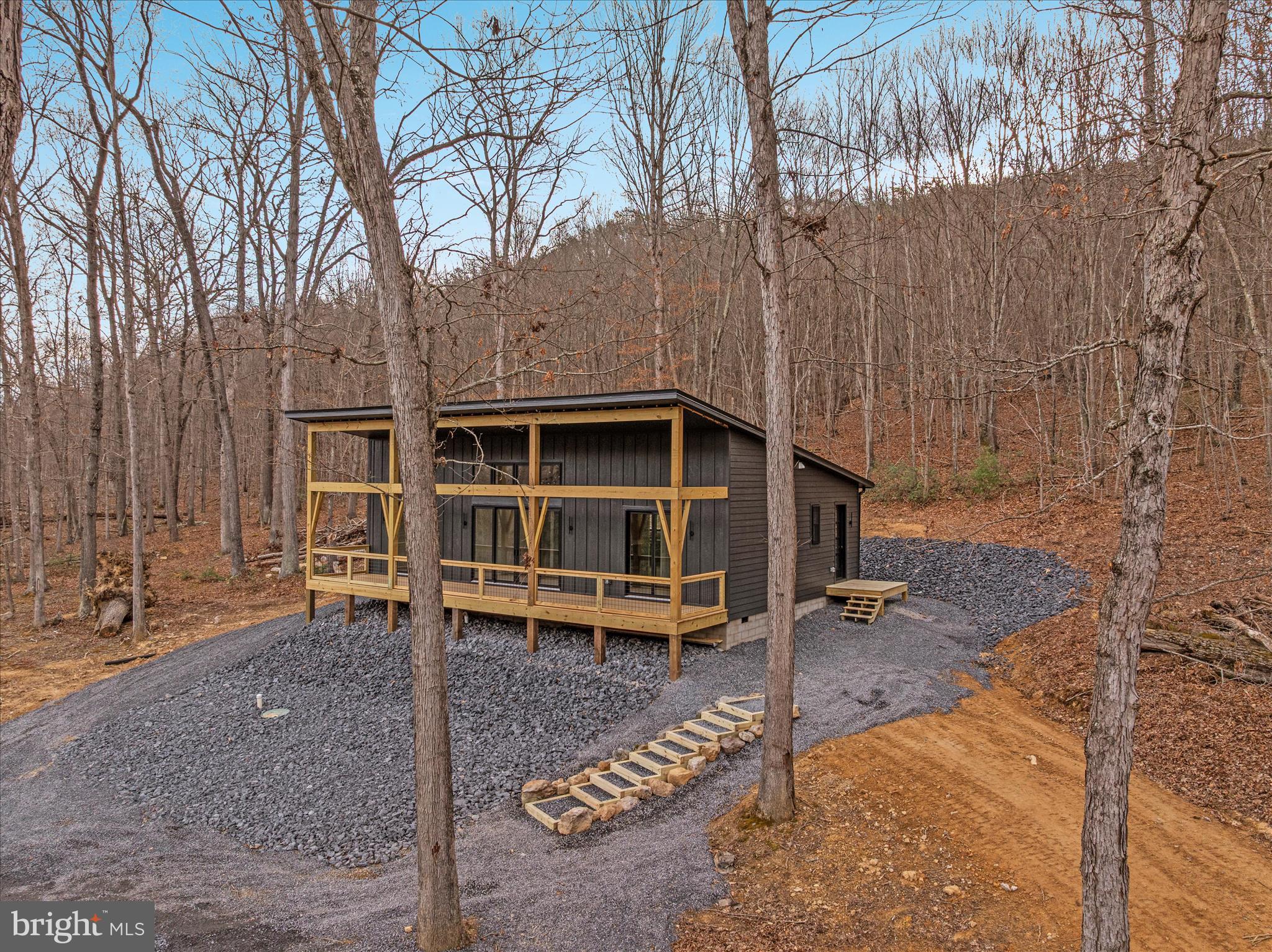 6292 Thorn Btm Road Lost City, WV 26810 - Photo 34 of 46 a view of house with a outdoor space