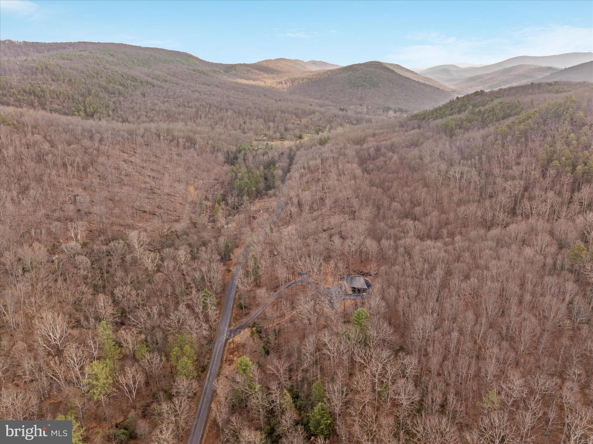 6292 Thorn Btm Road Lost City, WV 26810 - Photo 43 of 46 a view of a mountain range with trees in the background