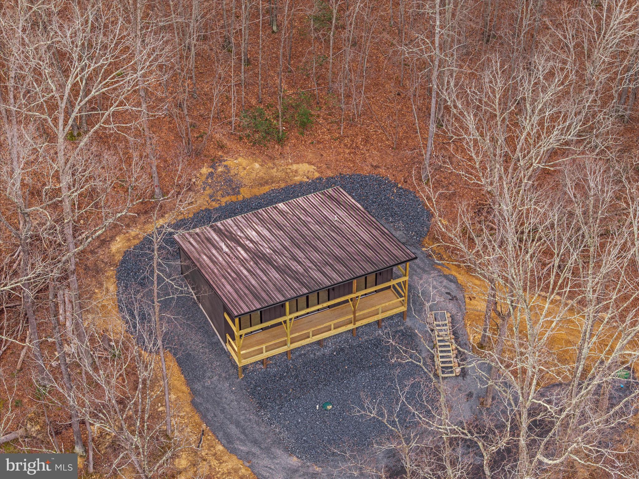 6292 Thorn Btm Road Lost City, WV 26810 - Photo 44 of 46 a view of sitting area in middle of the forest