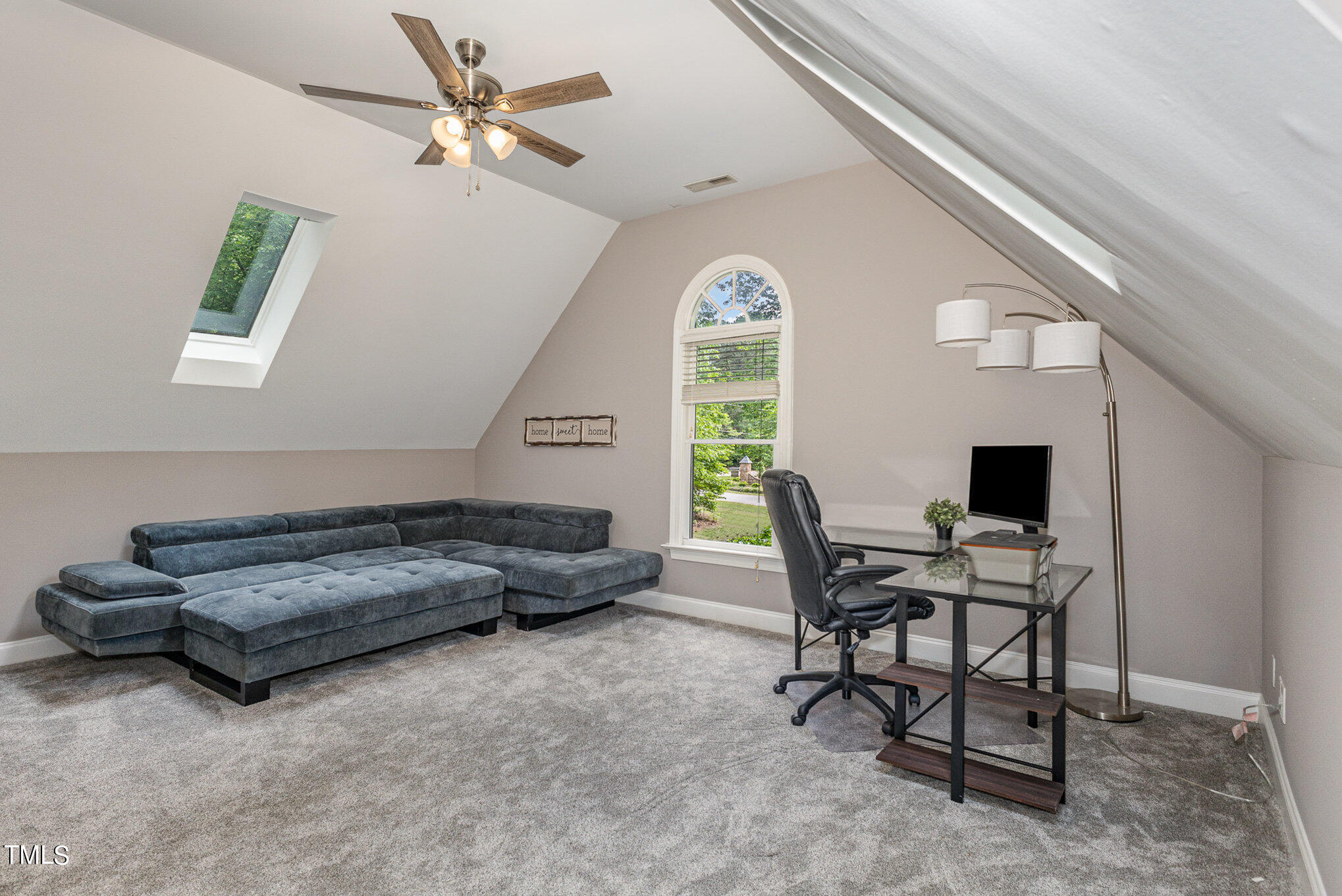 3200 Nimich Pond Way Raleigh, NC 27613 - Photo 20 of 26 a living room with furniture and a window