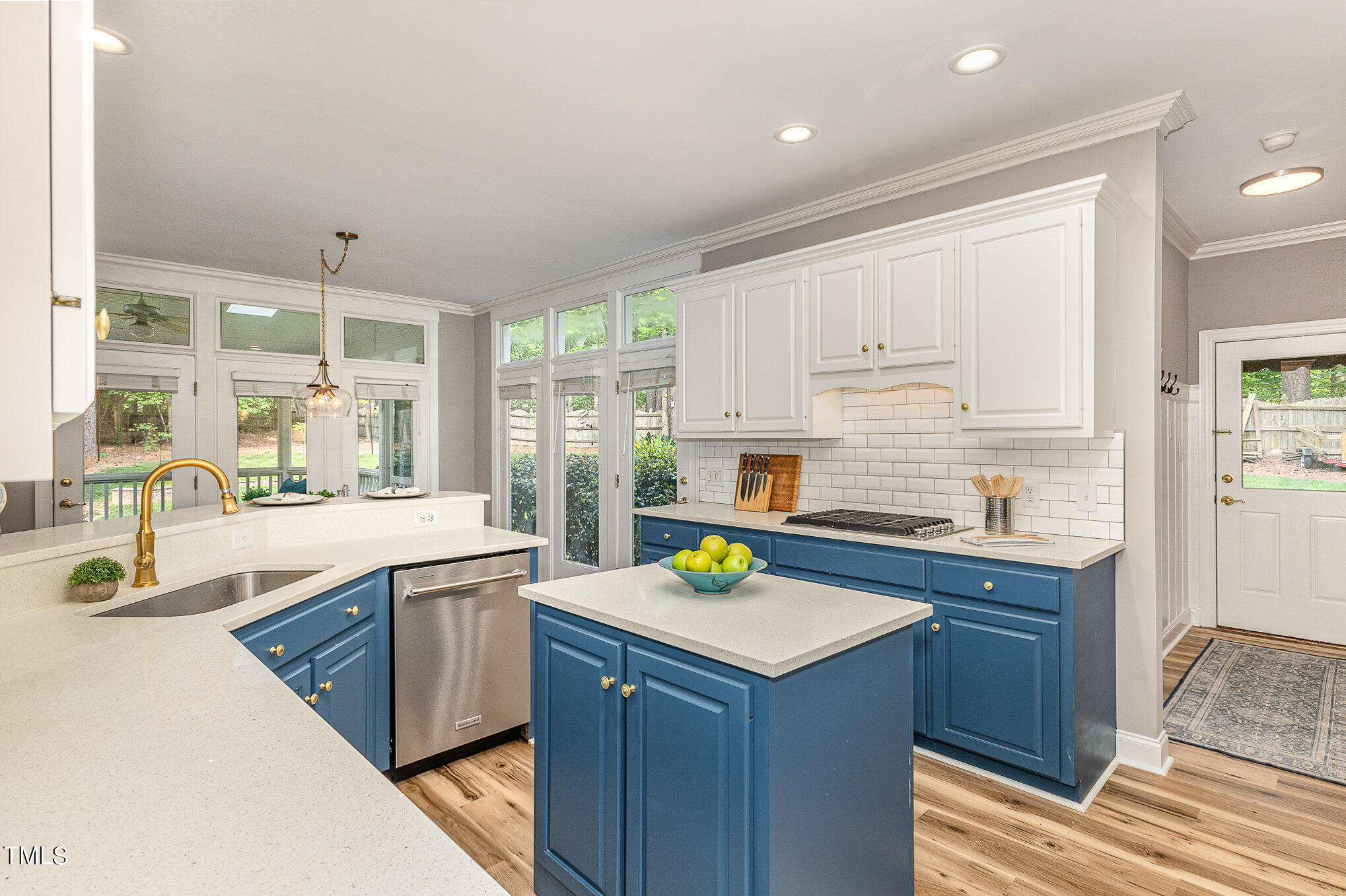 3200 Nimich Pond Way Raleigh, NC 27613 - Photo 5 of 26 a kitchen with a sink stove and cabinets