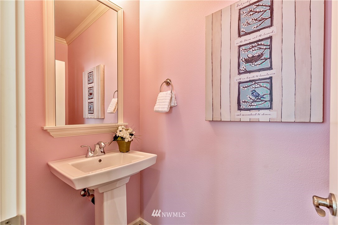 4521 185th Place Southeast Bothell, WA 98012 - Photo 11 of 33 a bathroom with a sink and a mirror