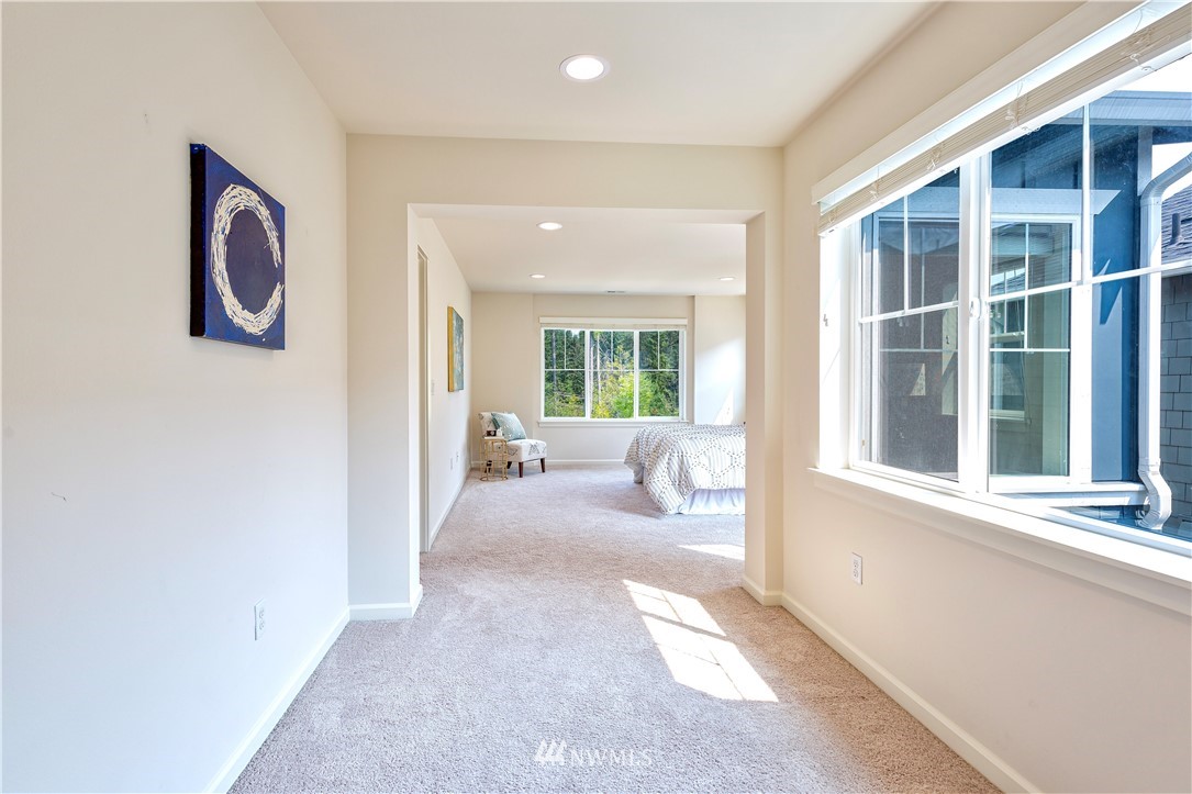 4521 185th Place Southeast Bothell, WA 98012 - Photo 13 of 33 a living room with furniture and a large window