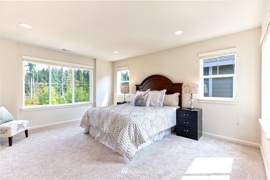 4521 185th Place Southeast Bothell, WA 98012 - Photo 17 of 33 a bedroom with a bed and a window