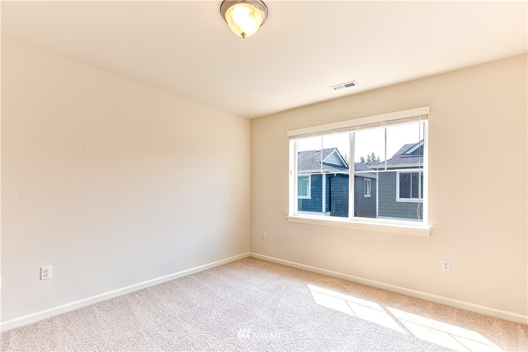 4521 185th Place Southeast Bothell, WA 98012 - Photo 20 of 33 an empty room with a window