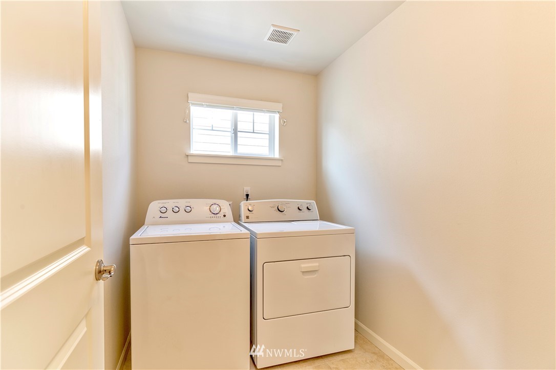 4521 185th Place Southeast Bothell, WA 98012 - Photo 23 of 33 a utility room with dryer and washer