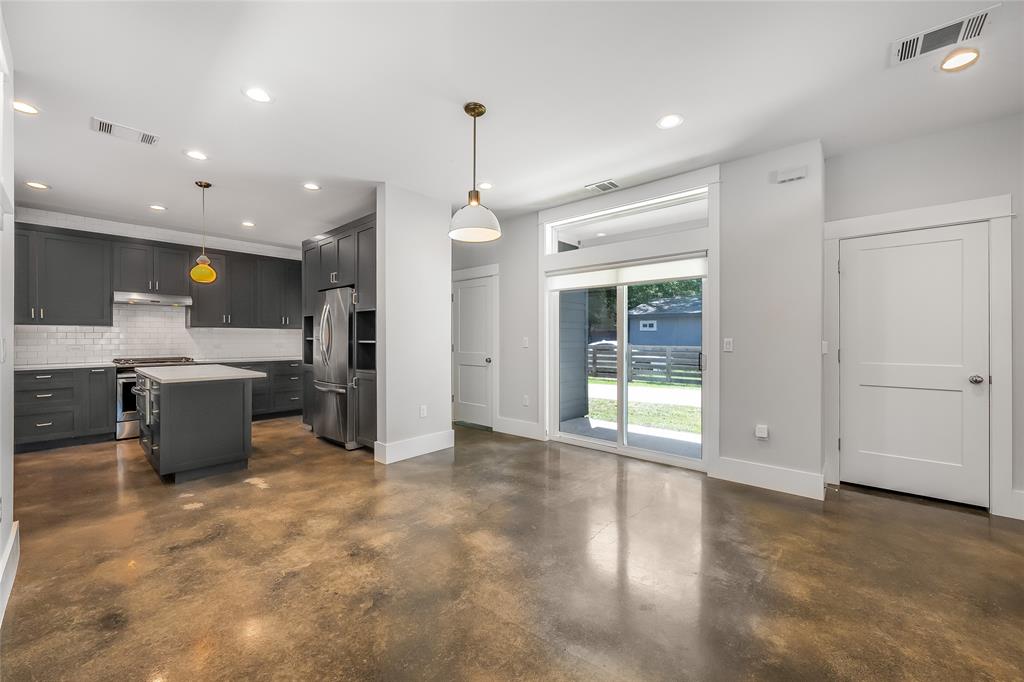 2821 Castro Street, Unit 1 Austin, TX 78702 - Photo 6 of 21 Spacious open-concept area featuring polished concrete flooring