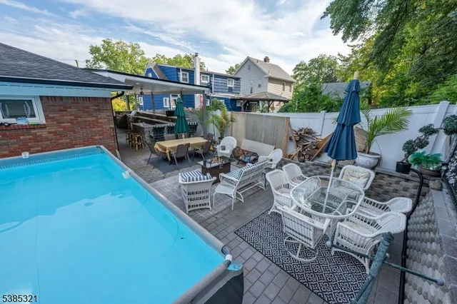 a view of yard with patio