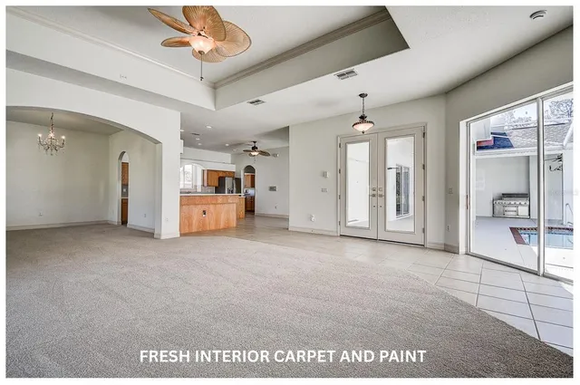 a view of an empty room with a sliding door