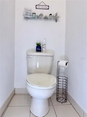 a bathroom with a toilet and a sink
