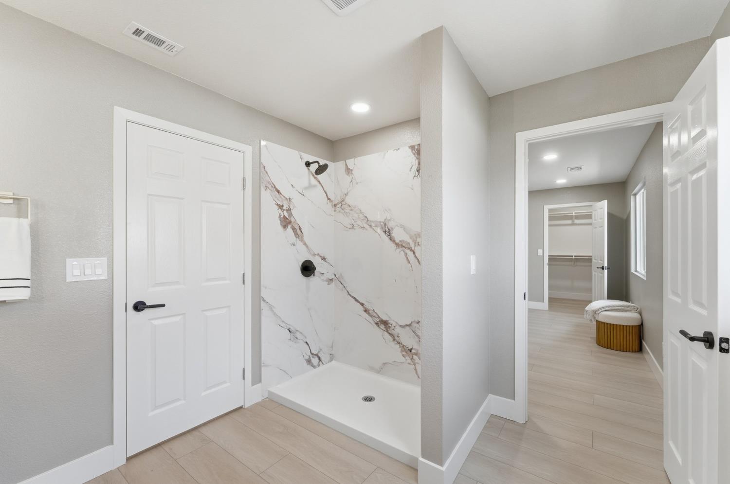 6237 Claus Road Riverbank, CA 95367 - Photo 25 of 53 a view of a hallway with bathroom and shower