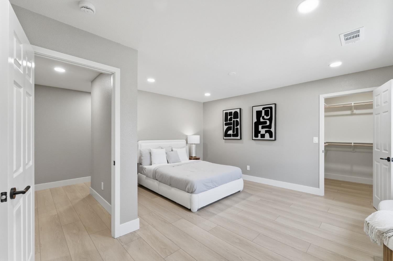 6237 Claus Road Riverbank, CA 95367 - Photo 27 of 53 a bedroom with a bed and a walk in closet
