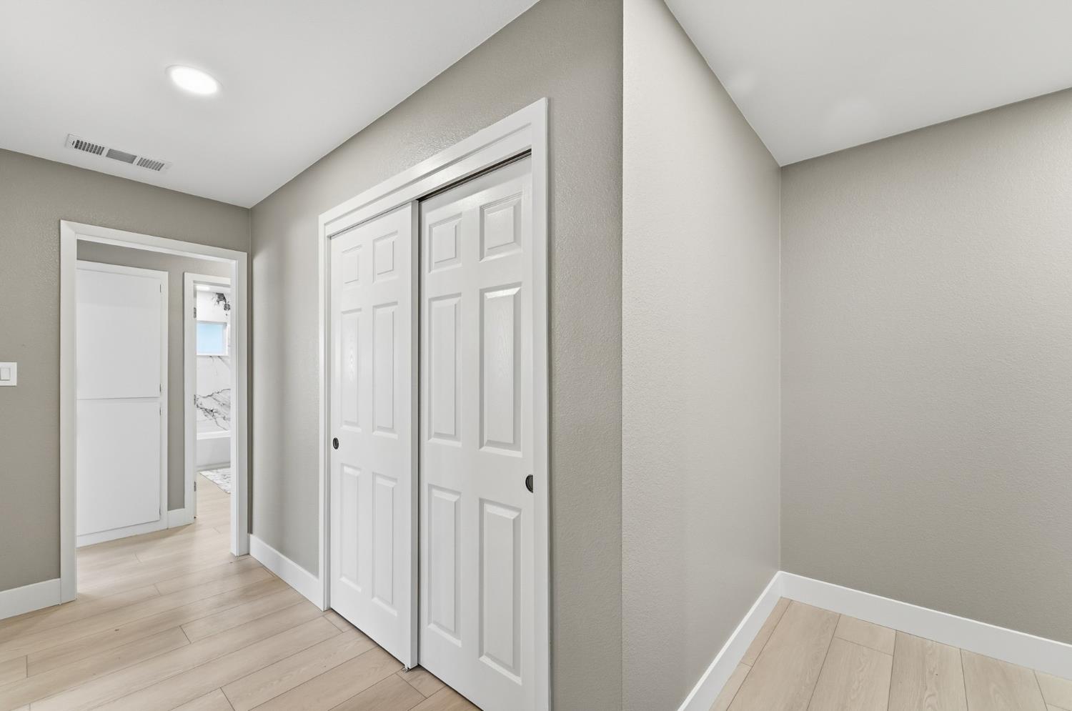 6237 Claus Road Riverbank, CA 95367 - Photo 33 of 53 a view of hallway with wooden floor