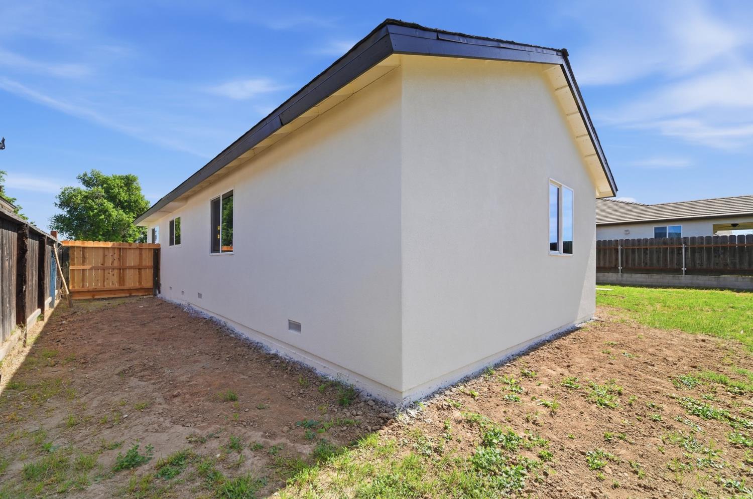 6237 Claus Road Riverbank, CA 95367 - Photo 42 of 53 a view of a backyard with a garden