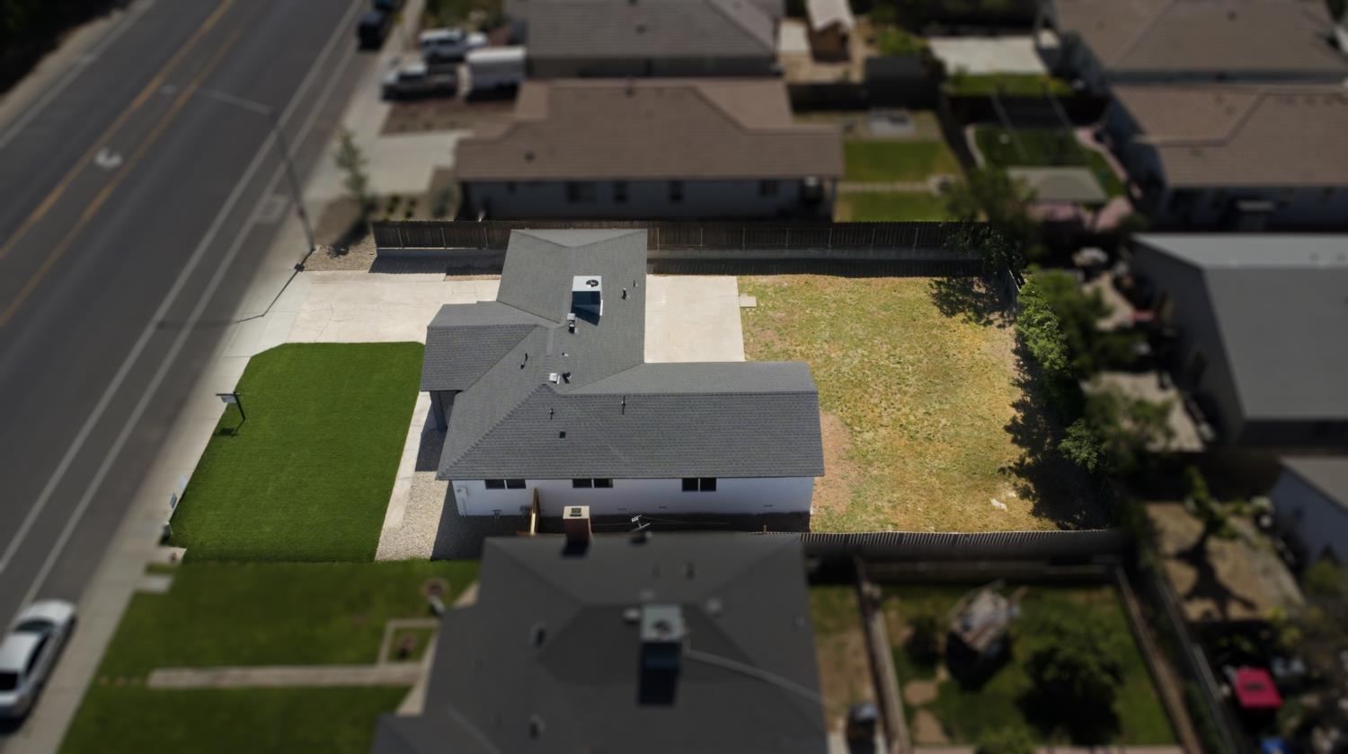 6237 Claus Road Riverbank, CA 95367 - Photo 51 of 53 an aerial view of a house with a yard