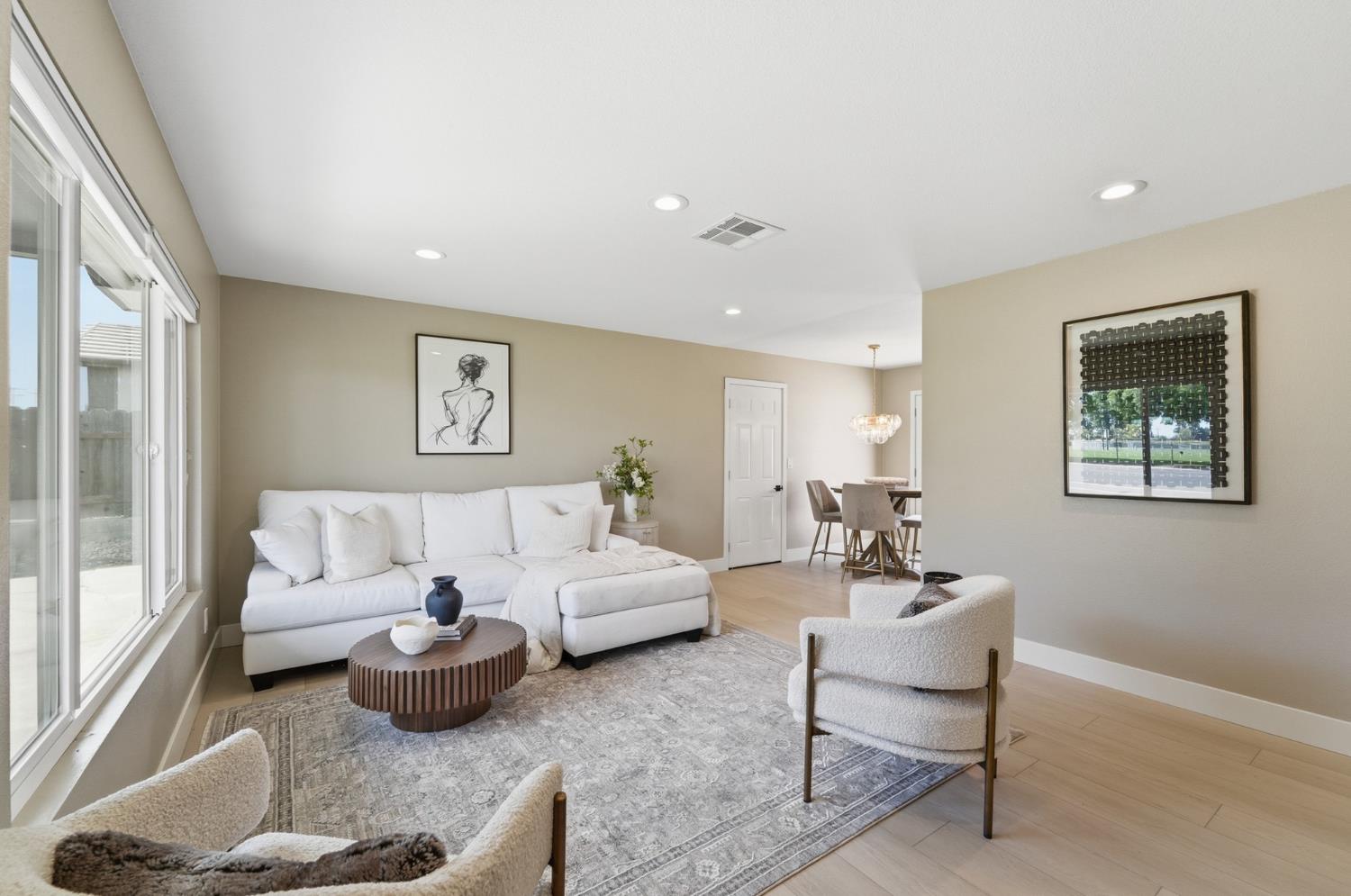 6237 Claus Road Riverbank, CA 95367 - Photo 7 of 53 a living room with furniture and a large window