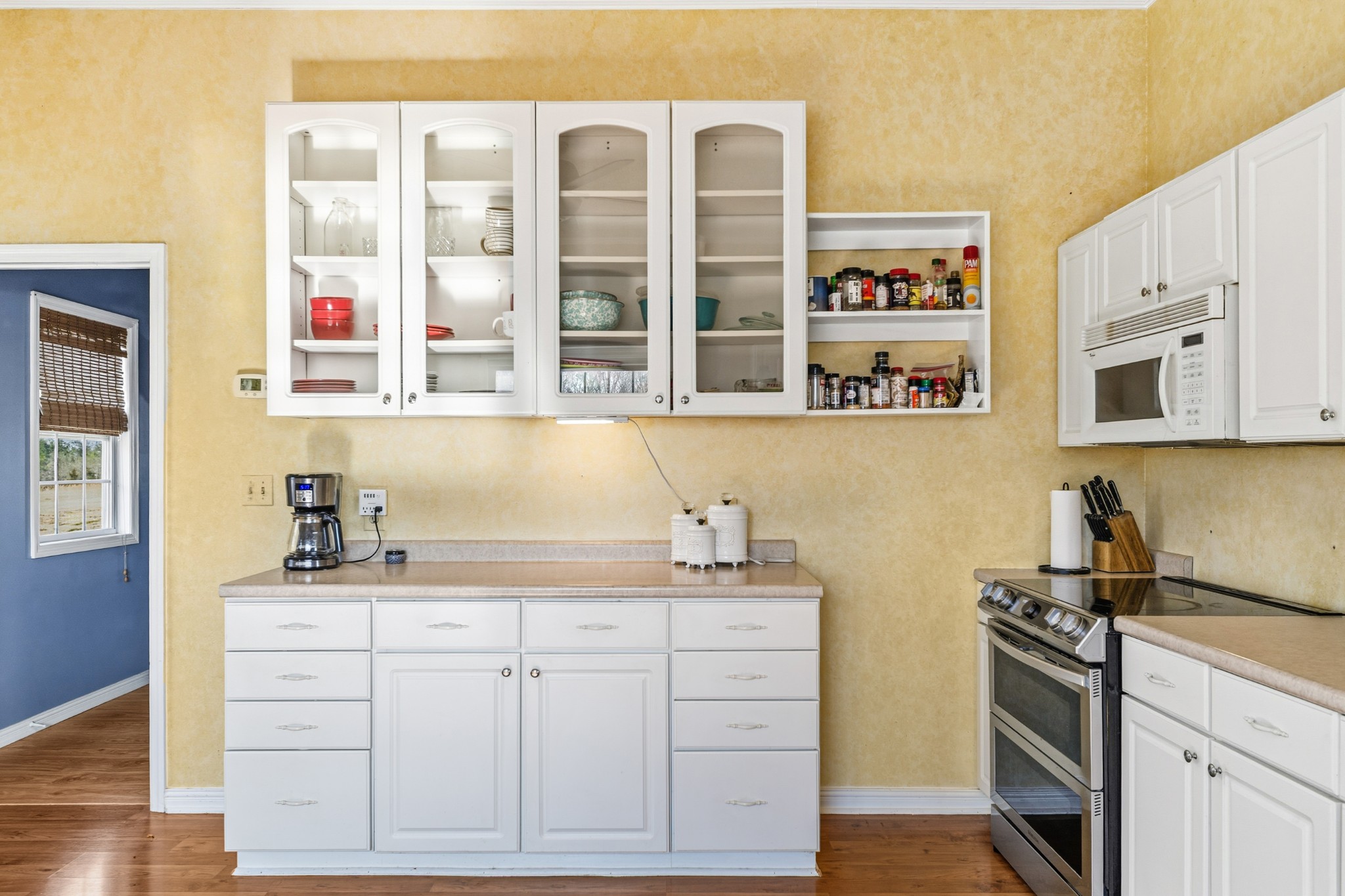 1825 Powell School Road Goodspring, TN 38460 - Photo 23 of 100 a kitchen with stainless steel appliances cabinets and a window