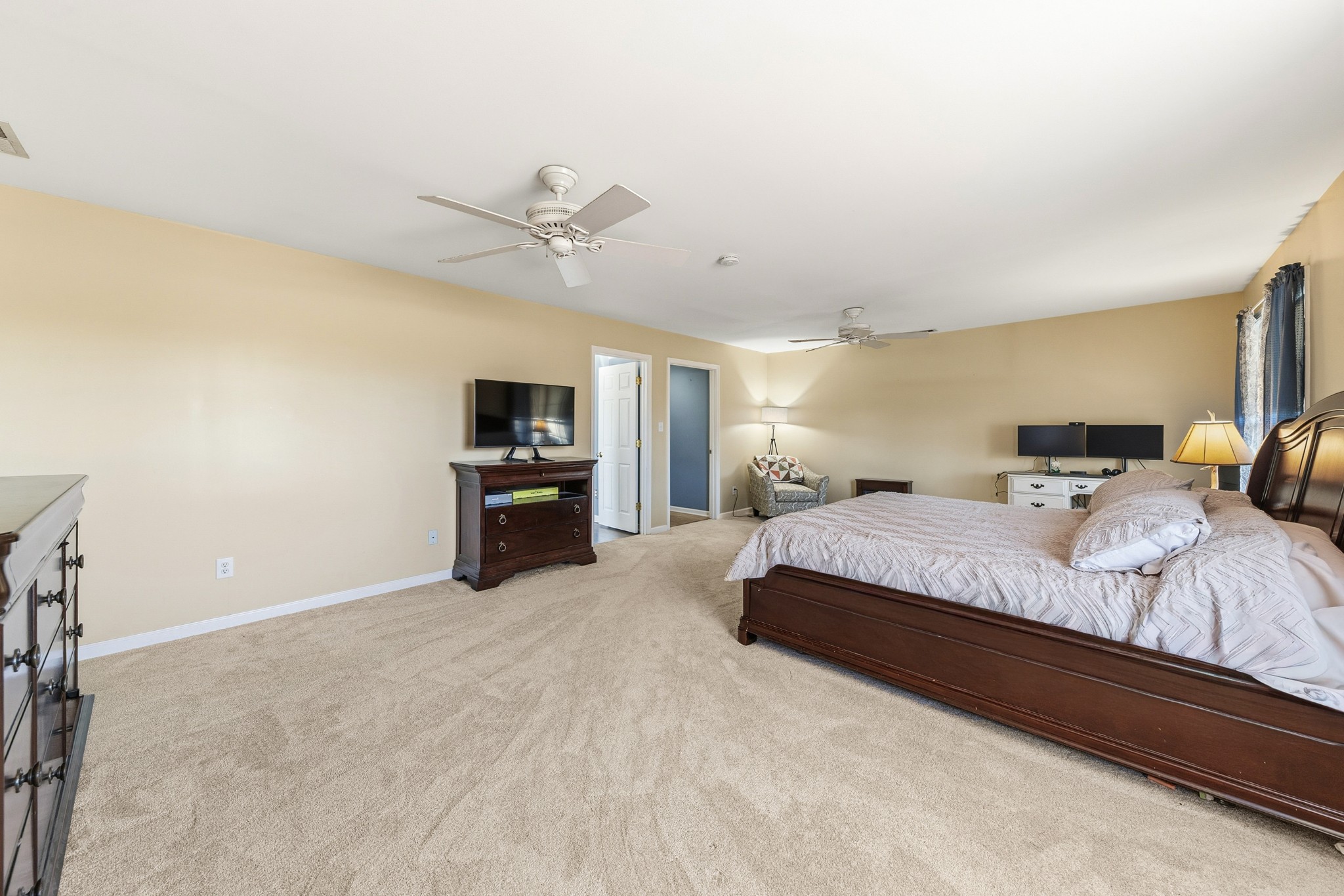 1825 Powell School Road Goodspring, TN 38460 - Photo 35 of 100 a spacious bedroom with a bed and ceiling fan