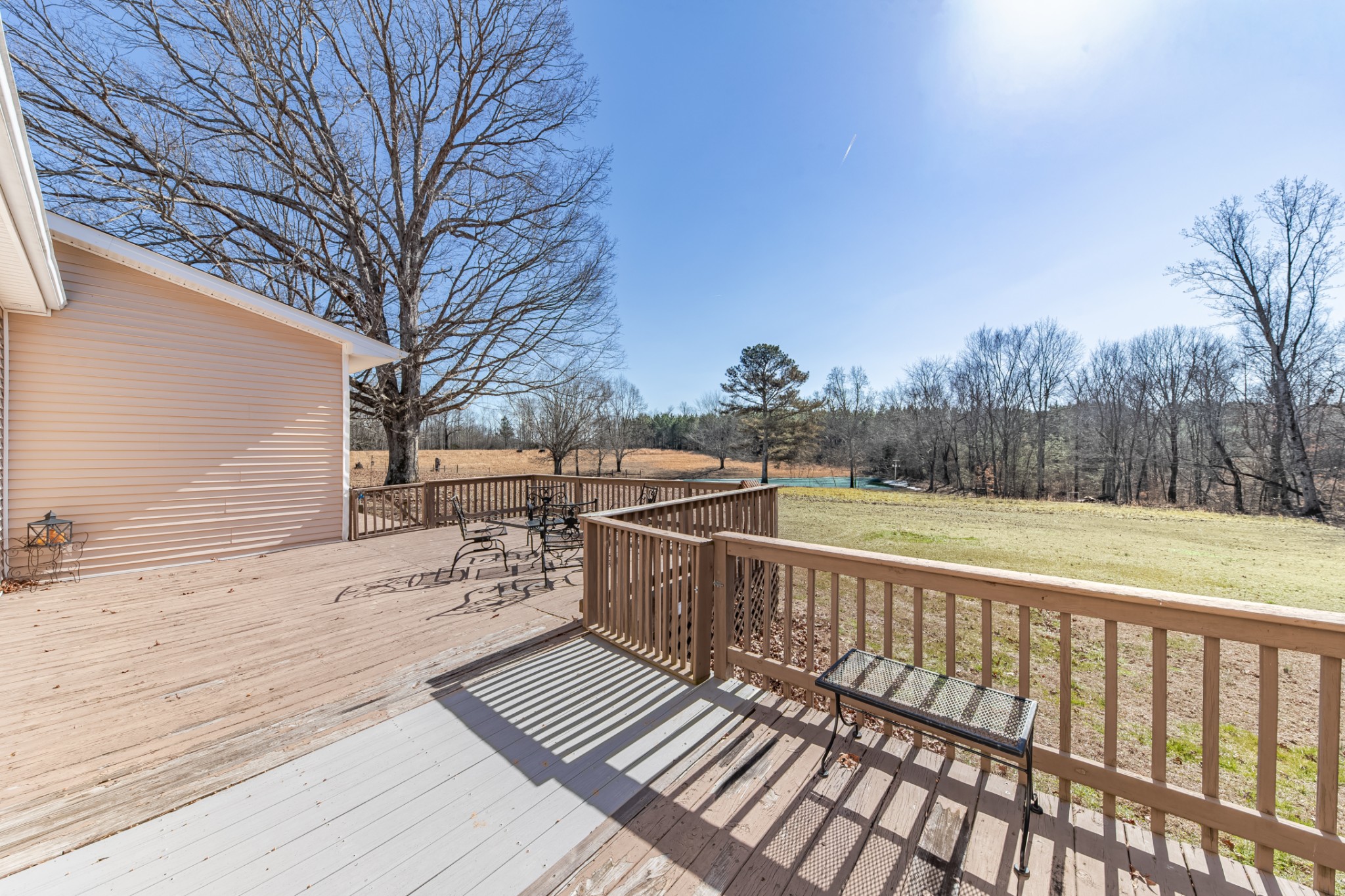 1825 Powell School Road Goodspring, TN 38460 - Photo 53 of 100 a view of a balcony with wooden floor and fence