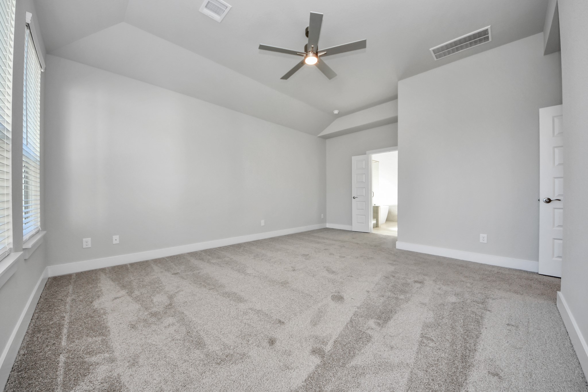 3102 Native Spg Drive Spring, TX 77373 - Photo 23 of 40 Another perspective unveils a comprehensive view of the serenity and comfort this primary suite offers. Sample photo of completed home with similar floor plan. Actual colors and selections may vary.