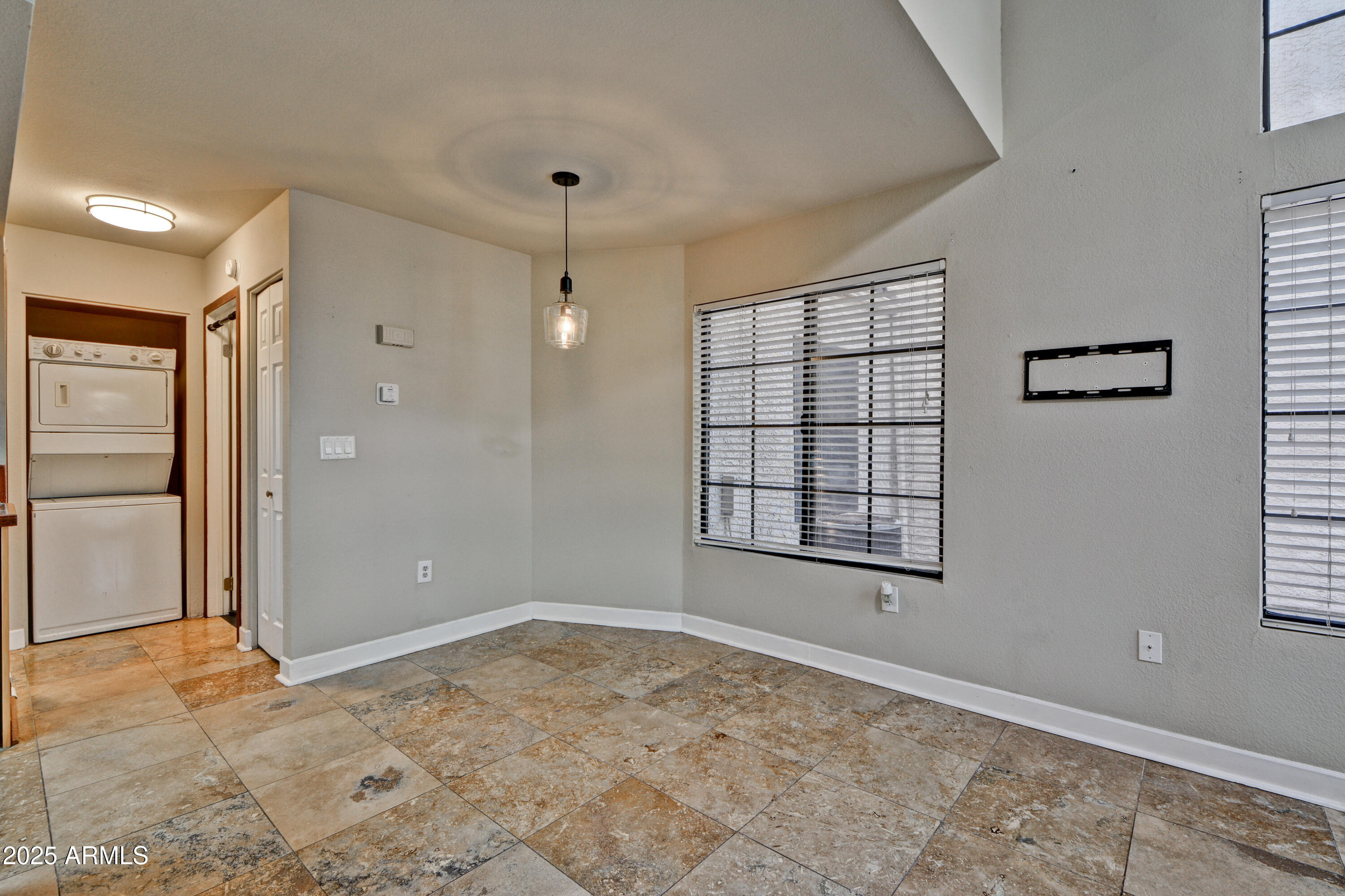 602 North May, Unit 17 Mesa, AZ 85201 - Photo 12 of 39 a view of an empty room and window