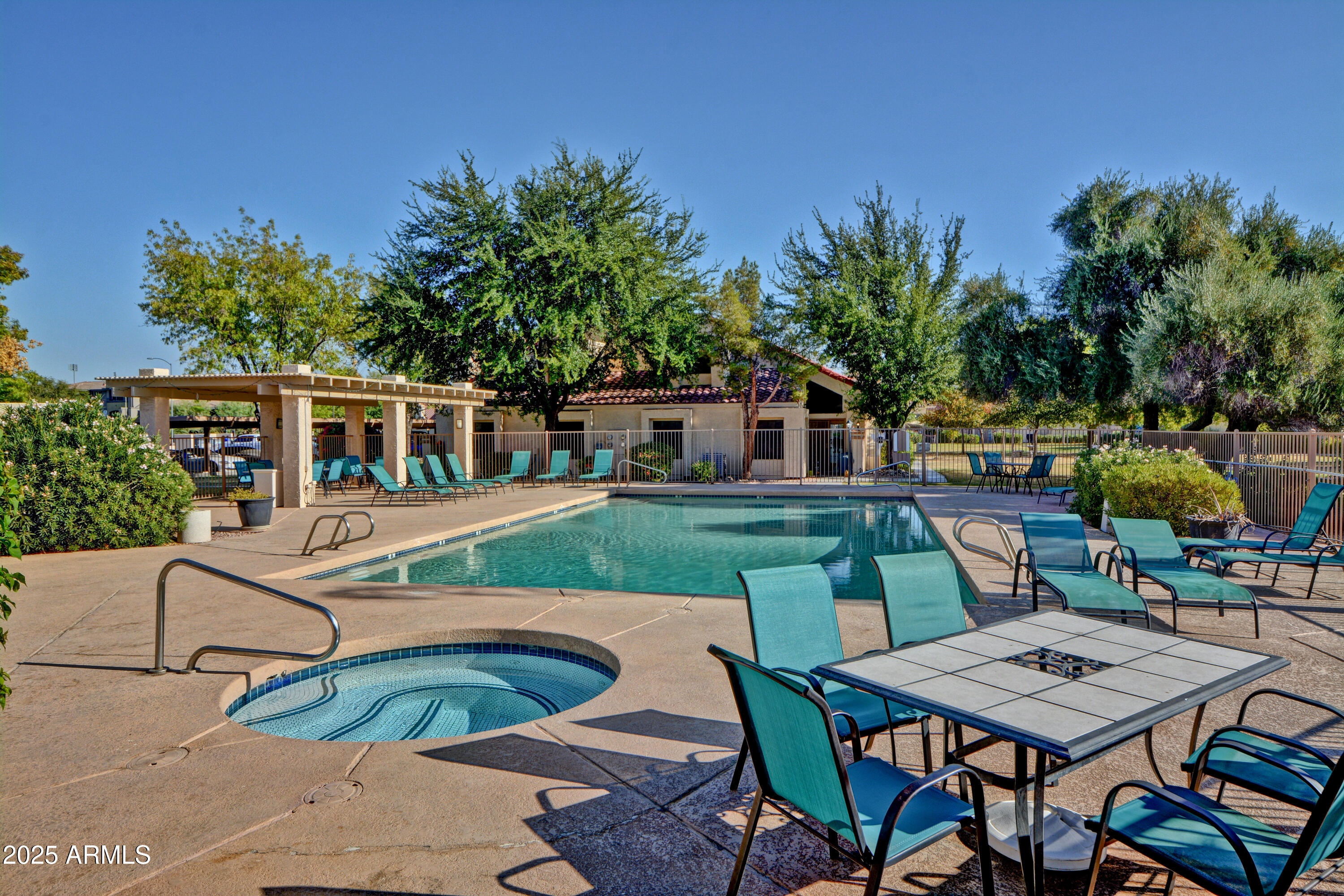 602 North May, Unit 17 Mesa, AZ 85201 - Photo 30 of 39 a view of house with patio entertaining space with seating area and barbeque oven