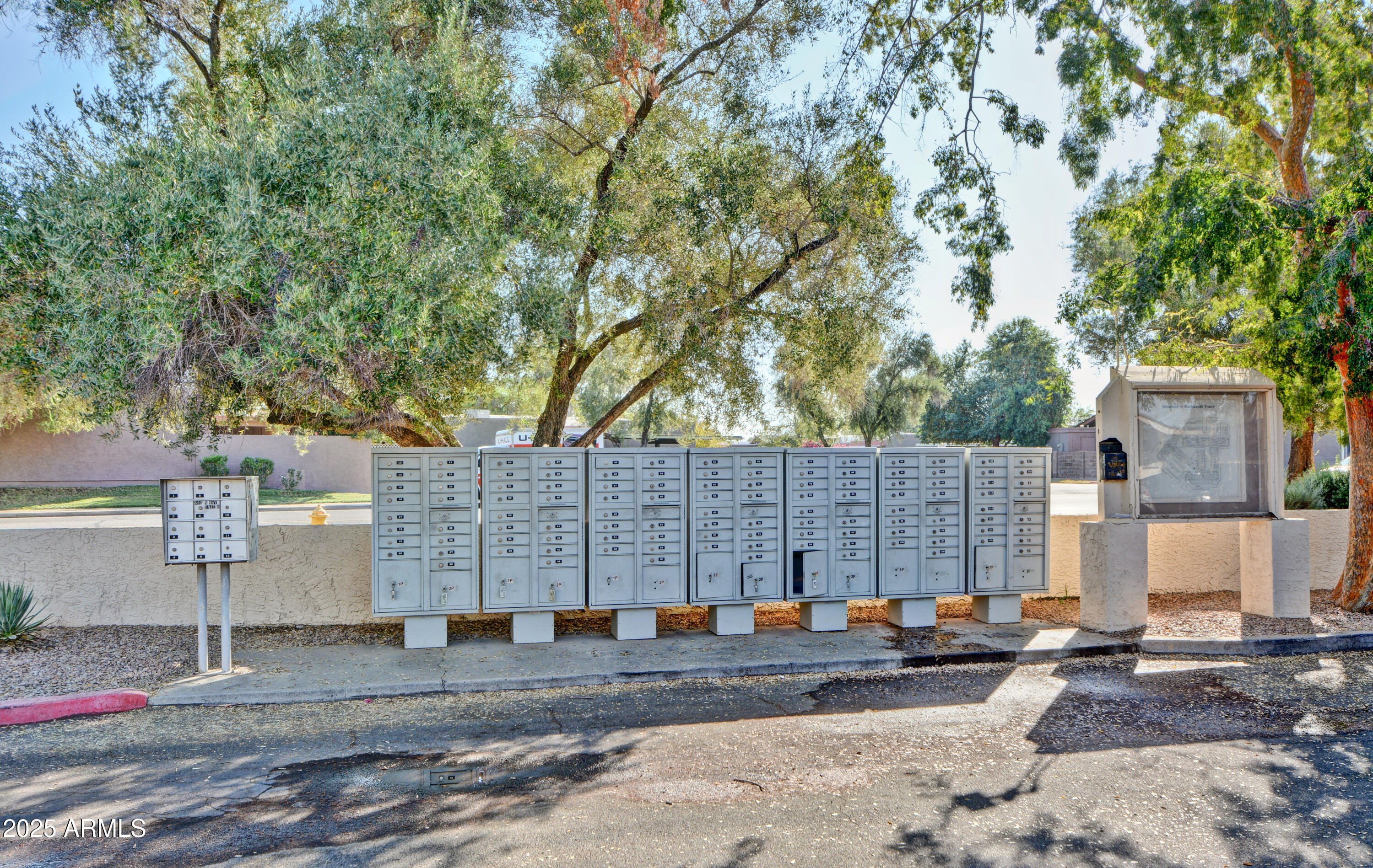 602 North May, Unit 17 Mesa, AZ 85201 - Photo 34 of 39 a view of a house with a backyard