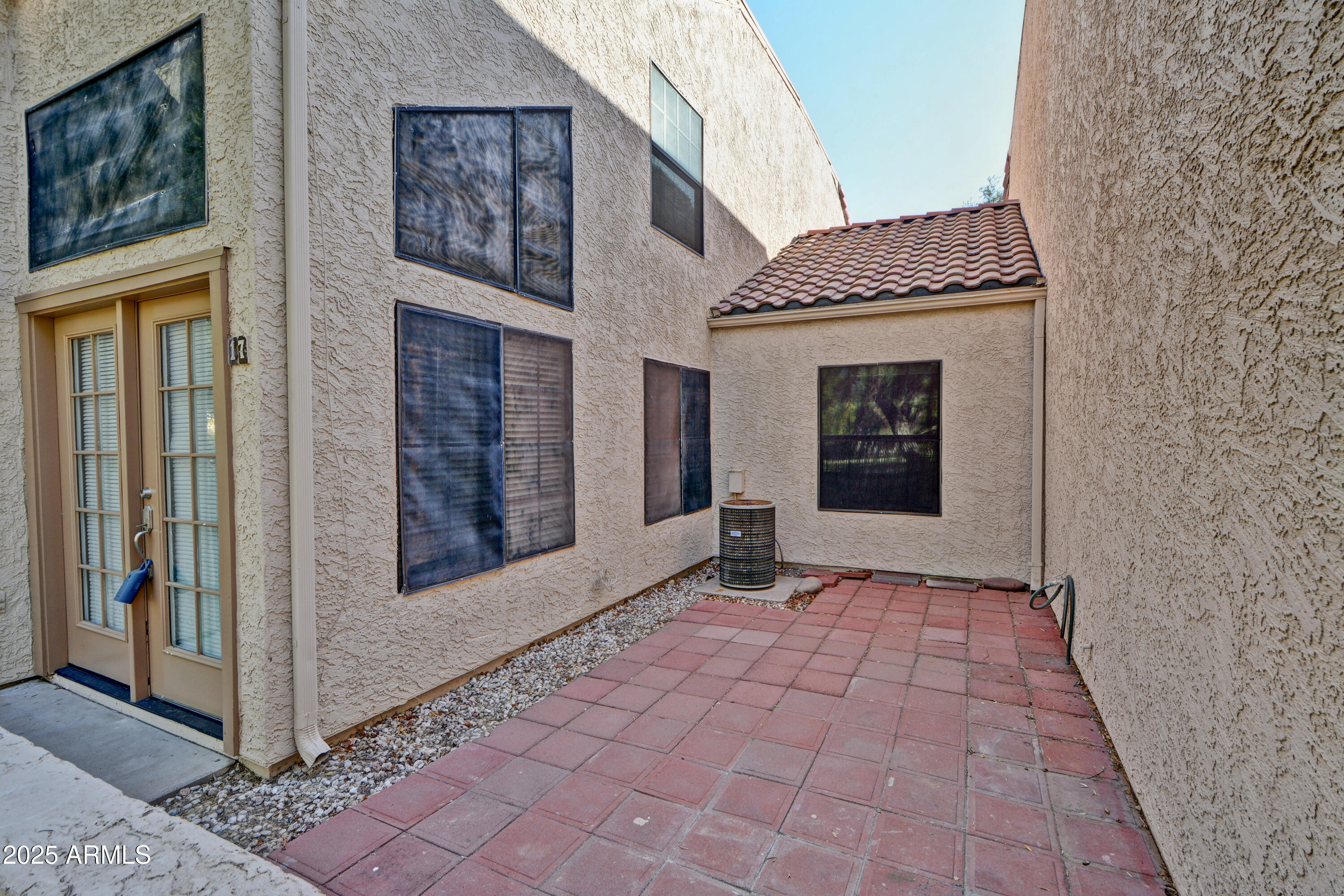 602 North May, Unit 17 Mesa, AZ 85201 - Photo 4 of 39 a view of an entrance door of the house