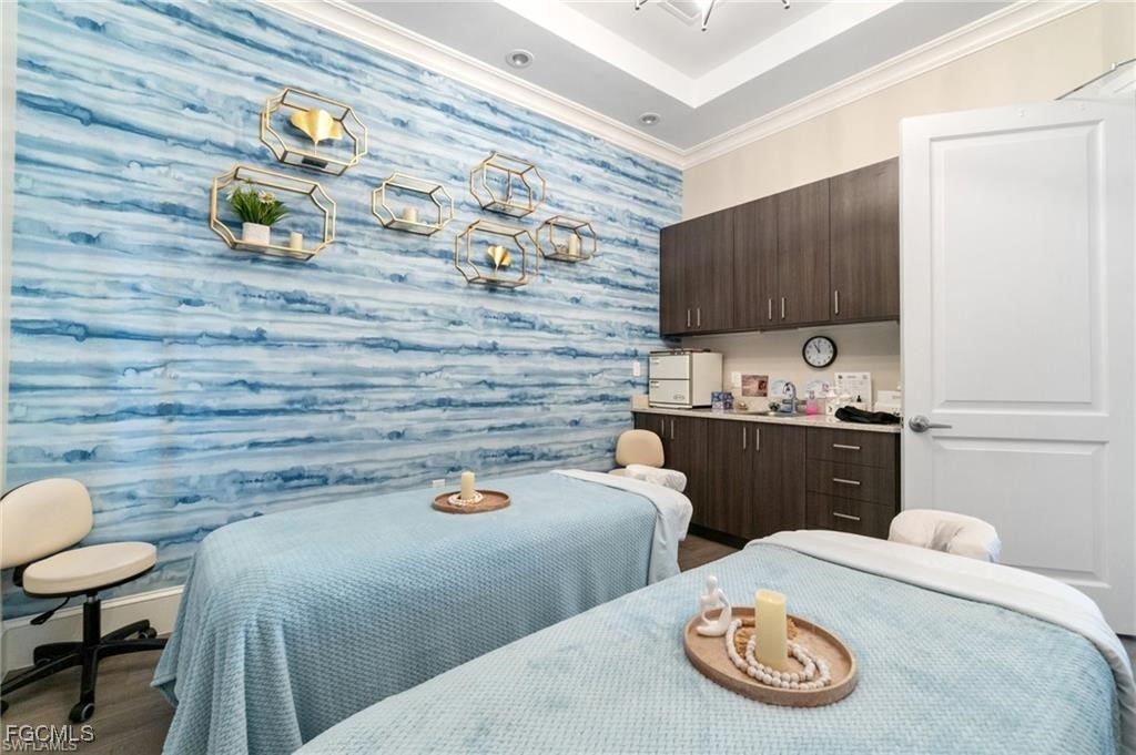 43997 Boardwalk Loop, Unit 1816 Punta Gorda, FL 33982 - Photo 24 of 44 a bedroom with a bed and a cabinets