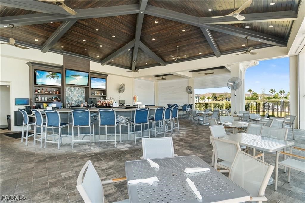 43997 Boardwalk Loop, Unit 1816 Punta Gorda, FL 33982 - Photo 31 of 44 a view of a swimming pool with outdoor seating