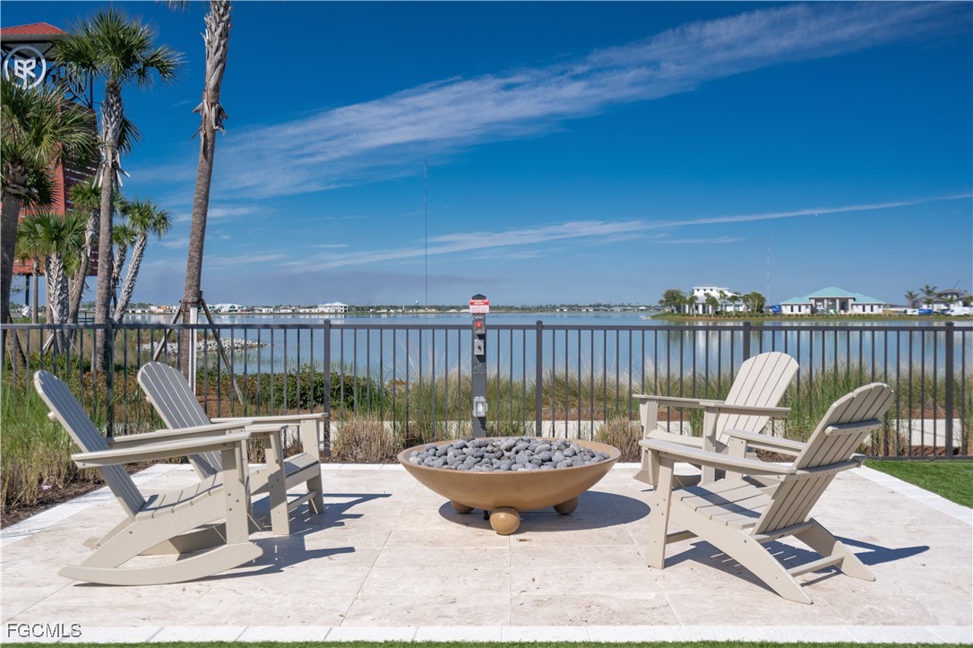 43997 Boardwalk Loop, Unit 1816 Punta Gorda, FL 33982 - Photo 39 of 44 a view of a chairs and table on the terrace