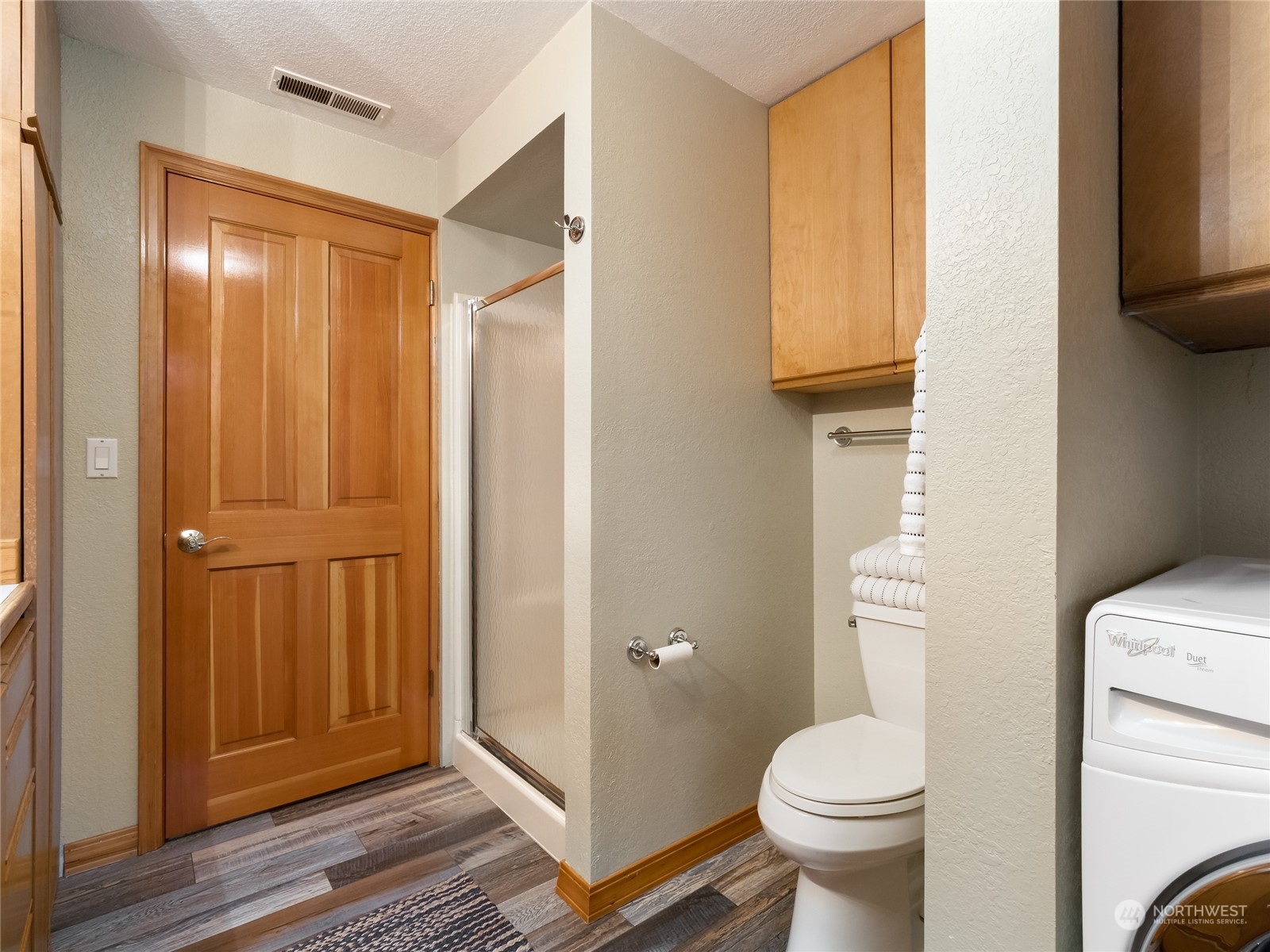 23022 Brier Road Brier, WA 98036 - Photo 21 of 33 a bathroom with a sink a toilet and shower