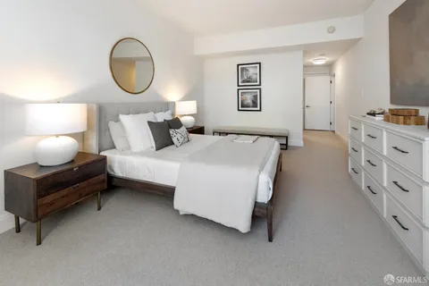 a view of a hallway with washer and dryer