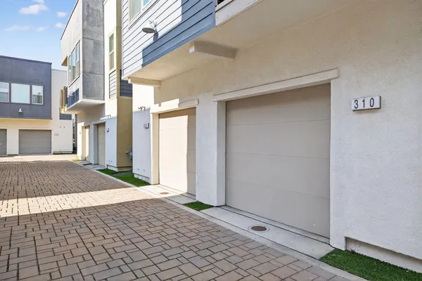a view of a house with a street