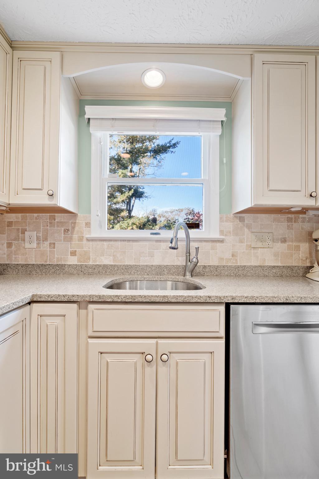 12762 Bradwell Road Herndon, VA 20171 - Photo 12 of 35 Sink overlooks the pretty backyard.