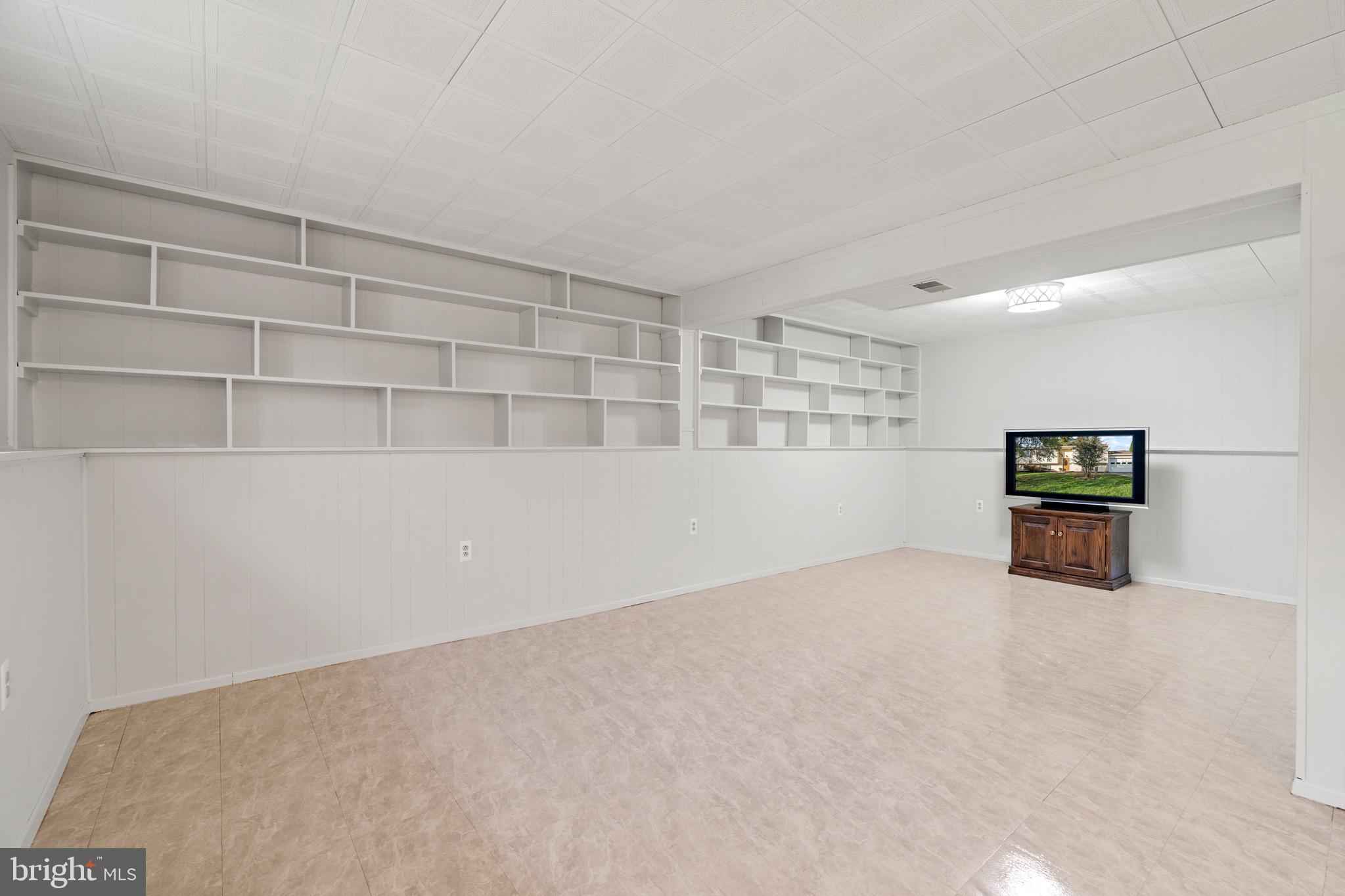 12762 Bradwell Road Herndon, VA 20171 - Photo 24 of 35 "L" shaped rec room - so many possibilities!
