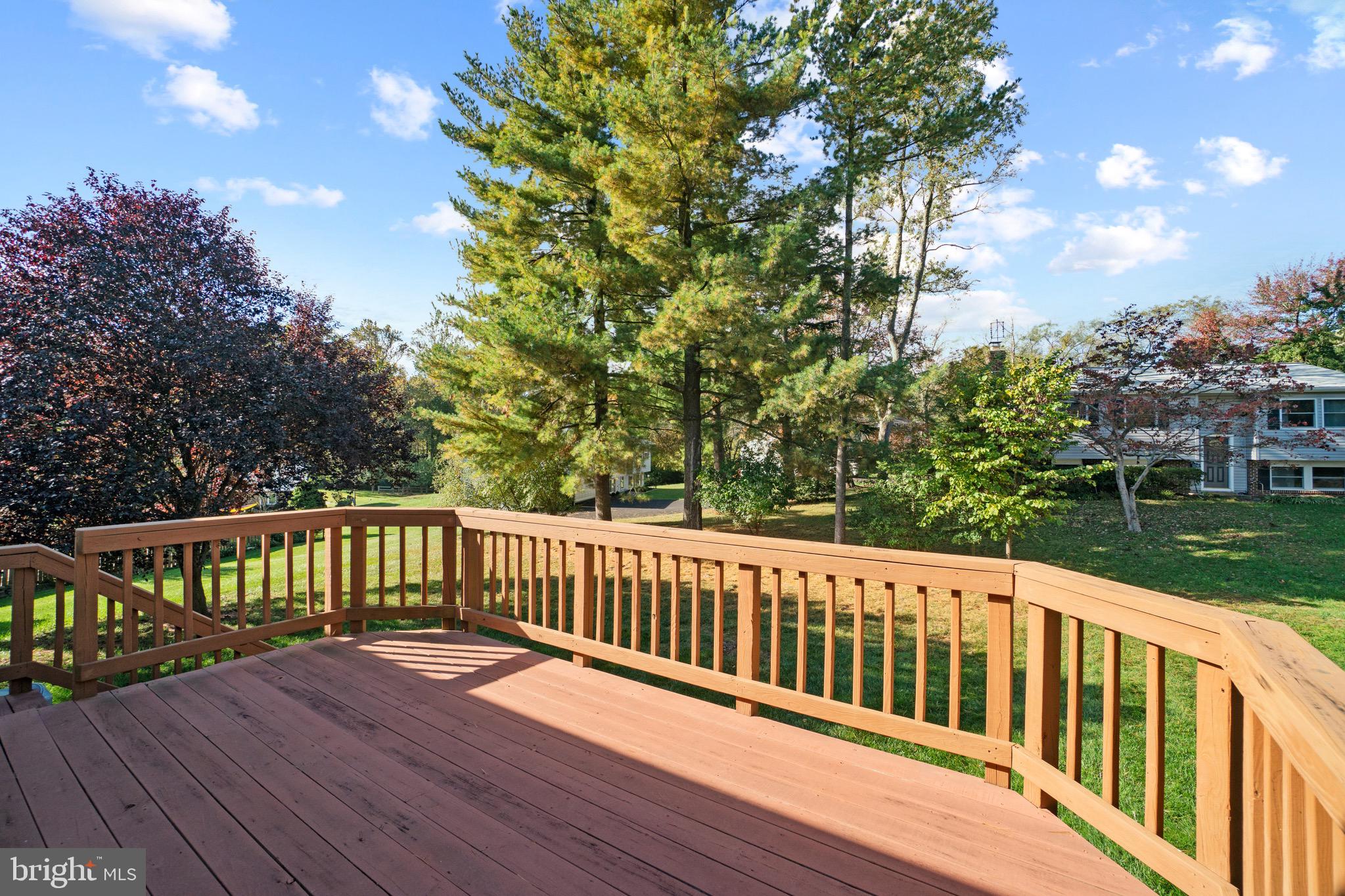 12762 Bradwell Road Herndon, VA 20171 - Photo 28 of 35 Big deck looks over pretty backyard.