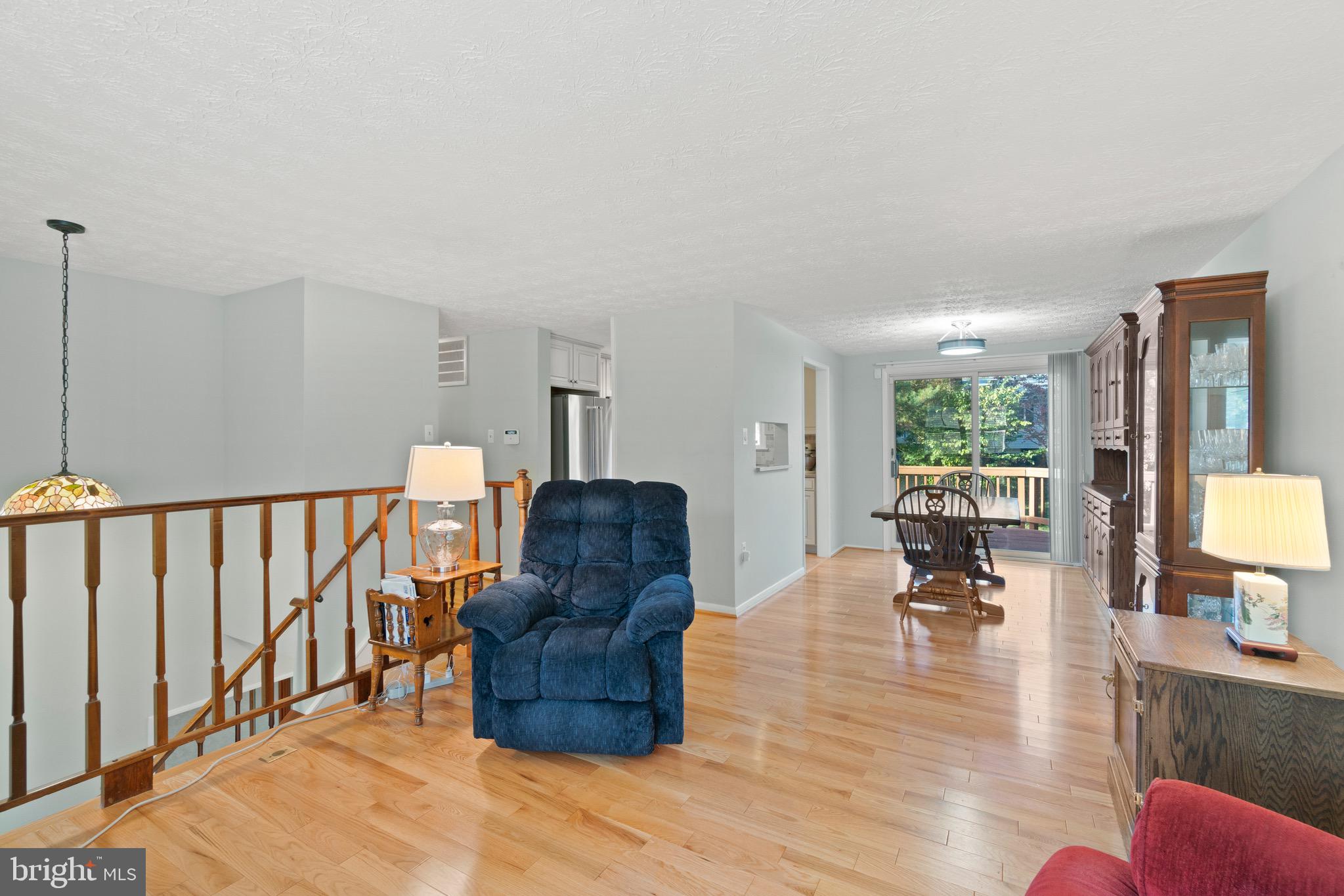 12762 Bradwell Road Herndon, VA 20171 - Photo 4 of 35 Beautiful hardwoods in living & dining rooms.