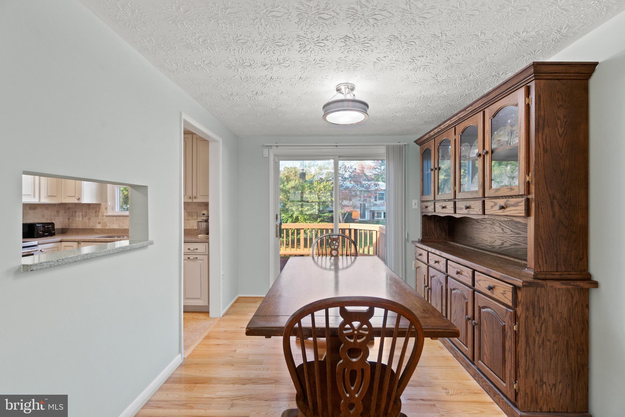 12762 Bradwell Road Herndon, VA 20171 - Photo 6 of 35 Dining room leads to spacious deck.